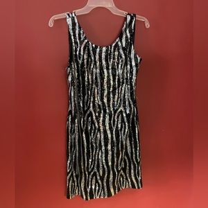 Sequin zebra dress. I don’t remember the brand. Pristine!